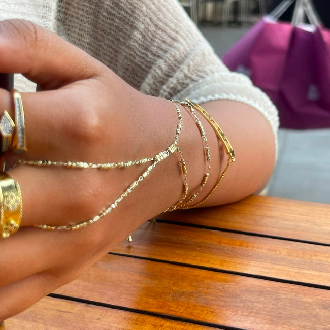 studded hand chain